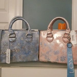 Pink or blue crossbody purse NEW with tags!